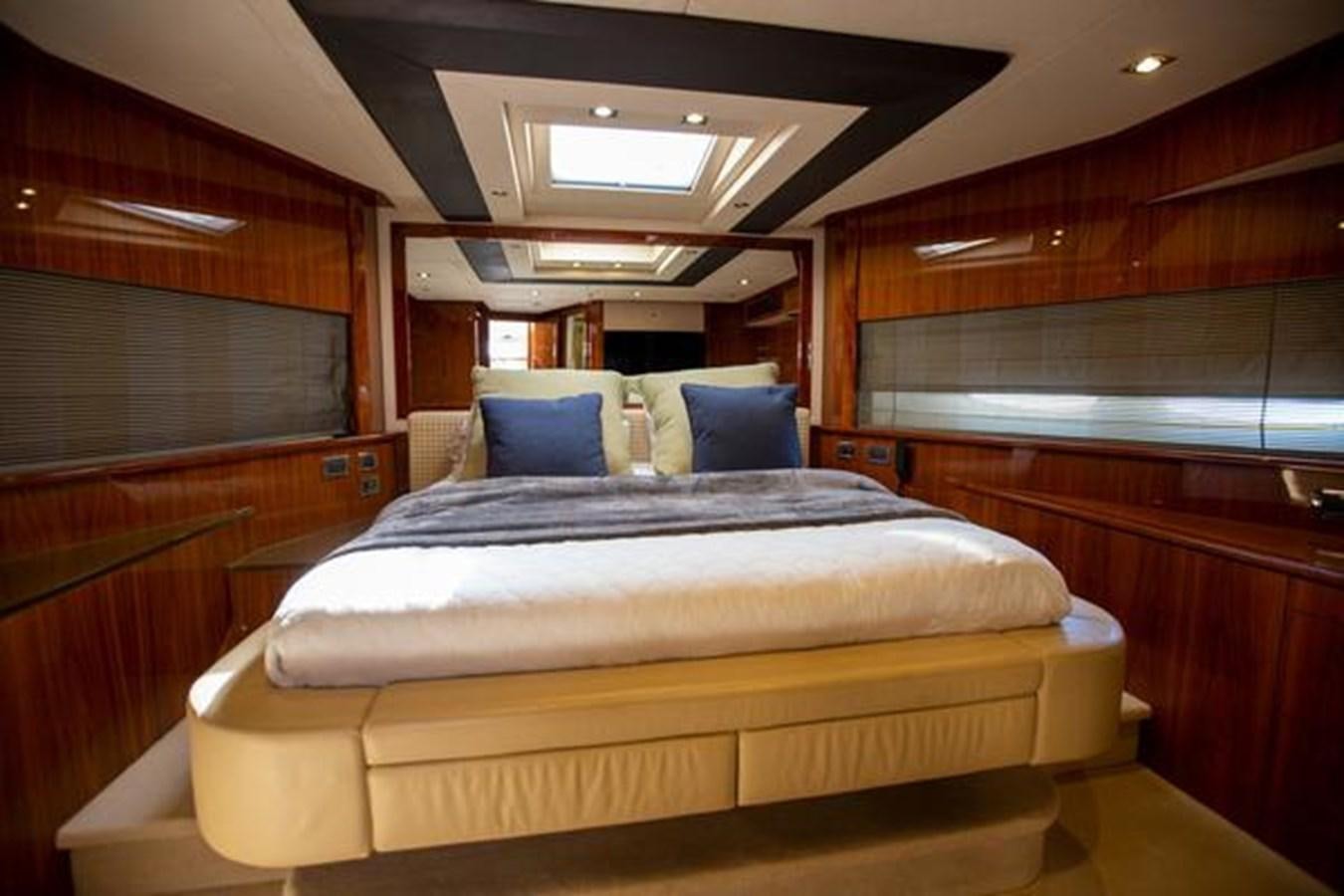 a bed in a room aboard THE CABANA Yacht for Sale