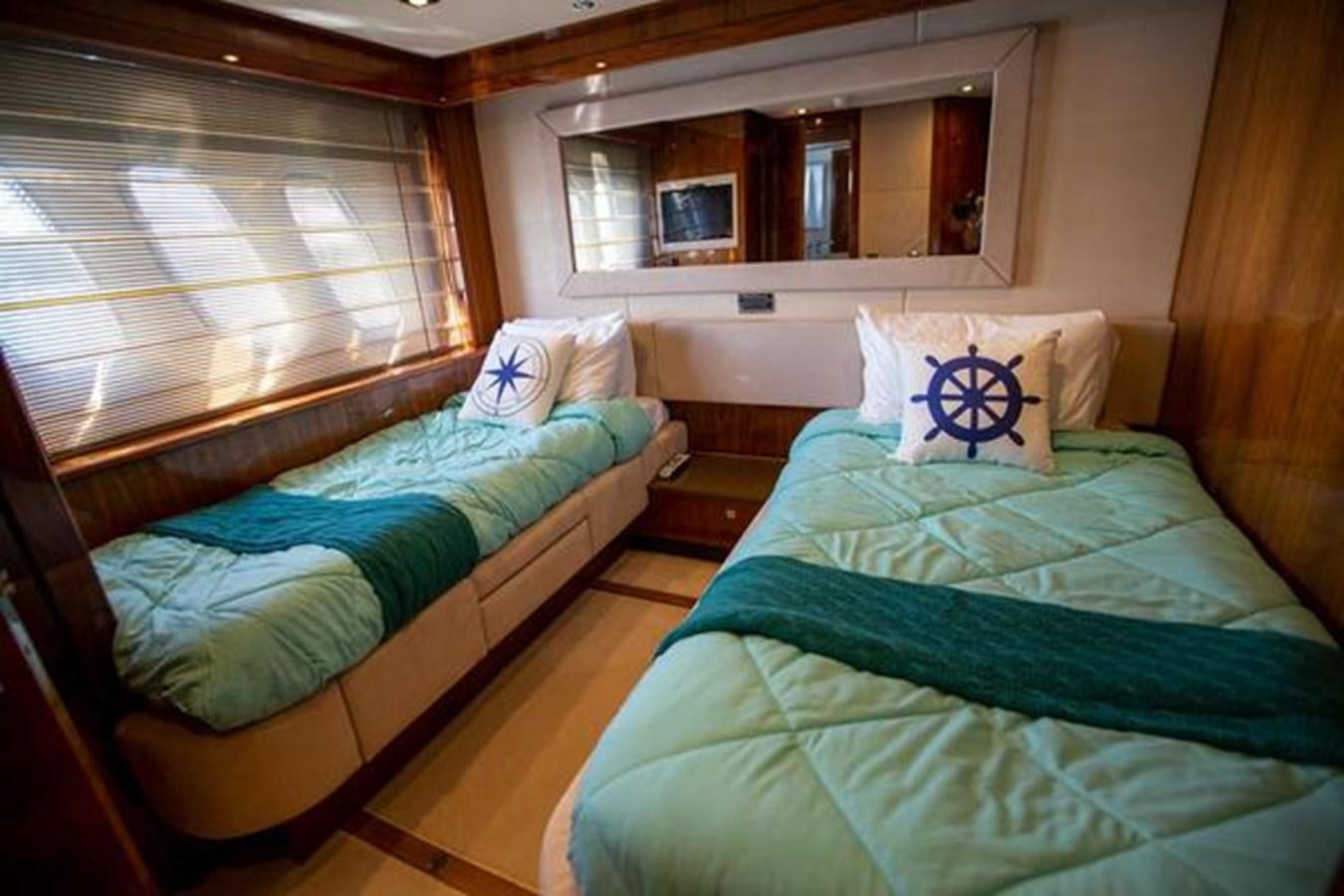 beds in a room aboard THE CABANA Yacht for Sale