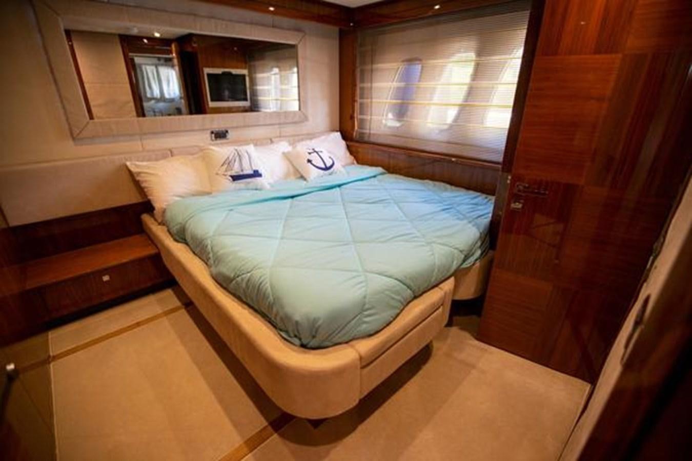 a bed in a room aboard THE CABANA Yacht for Sale