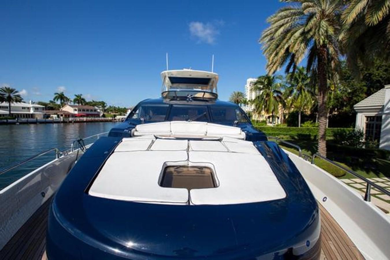 a boat on a dock aboard THE CABANA Yacht for Sale