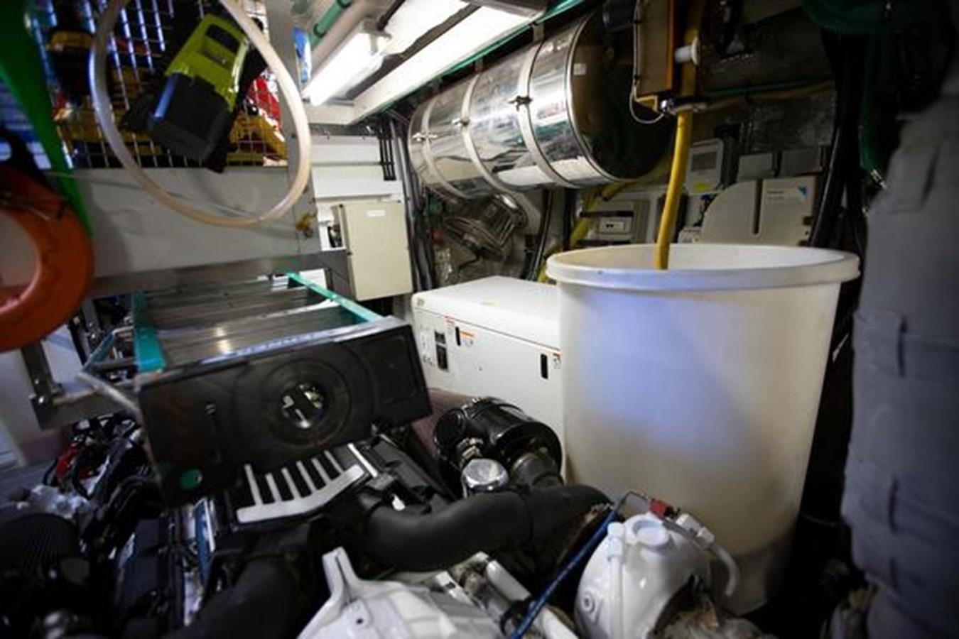 a machine with a large metal cylinder aboard THE CABANA Yacht for Sale