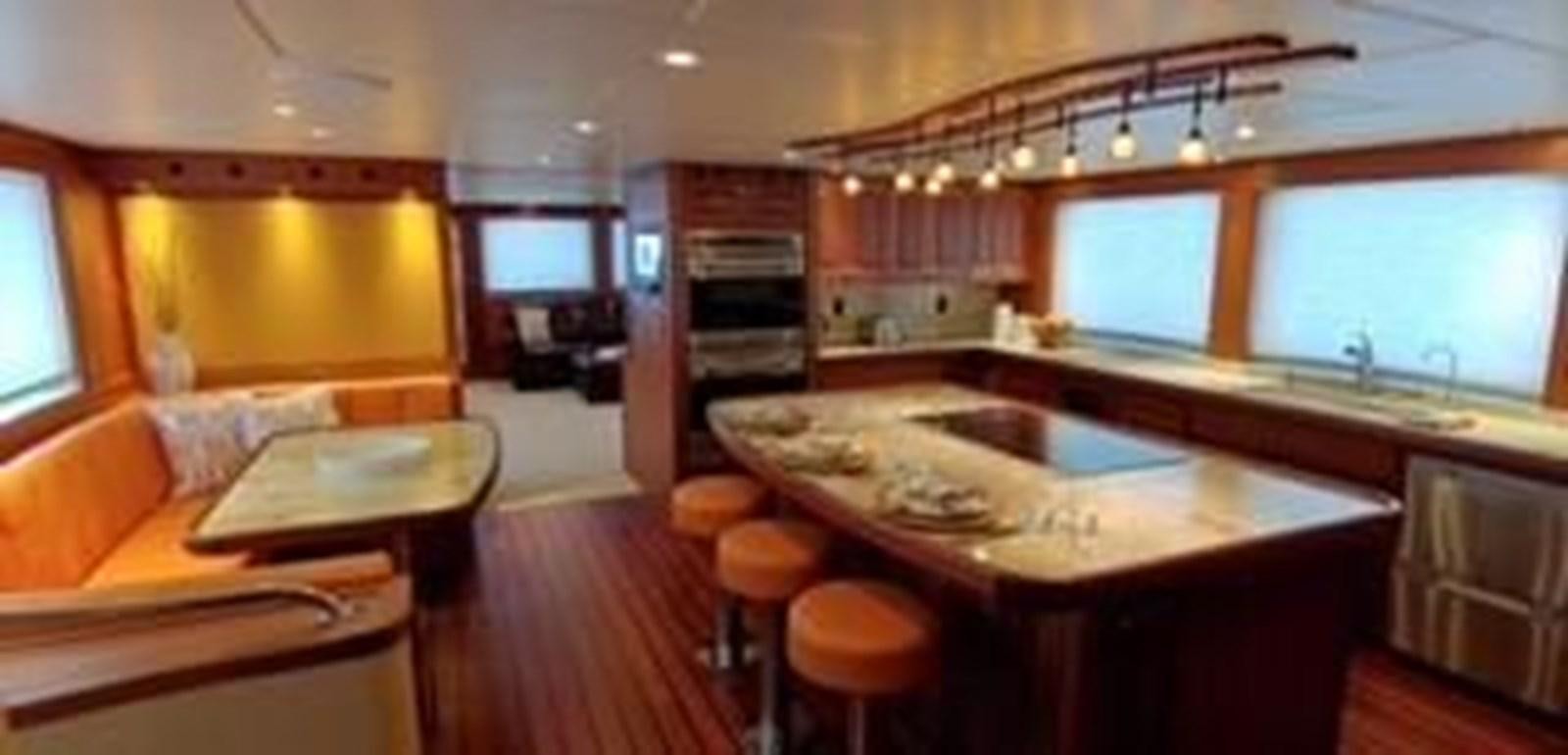 a large kitchen with a large island aboard ALLSEAS 92 EXPEDITION Yacht for Sale