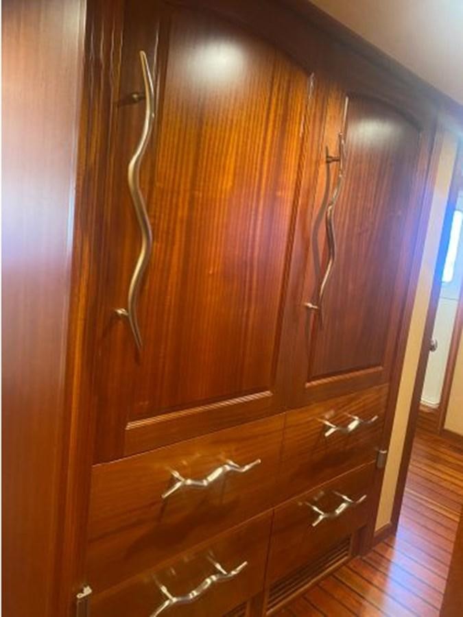 a wooden cabinet with drawers aboard ALLSEAS 92 EXPEDITION Yacht for Sale