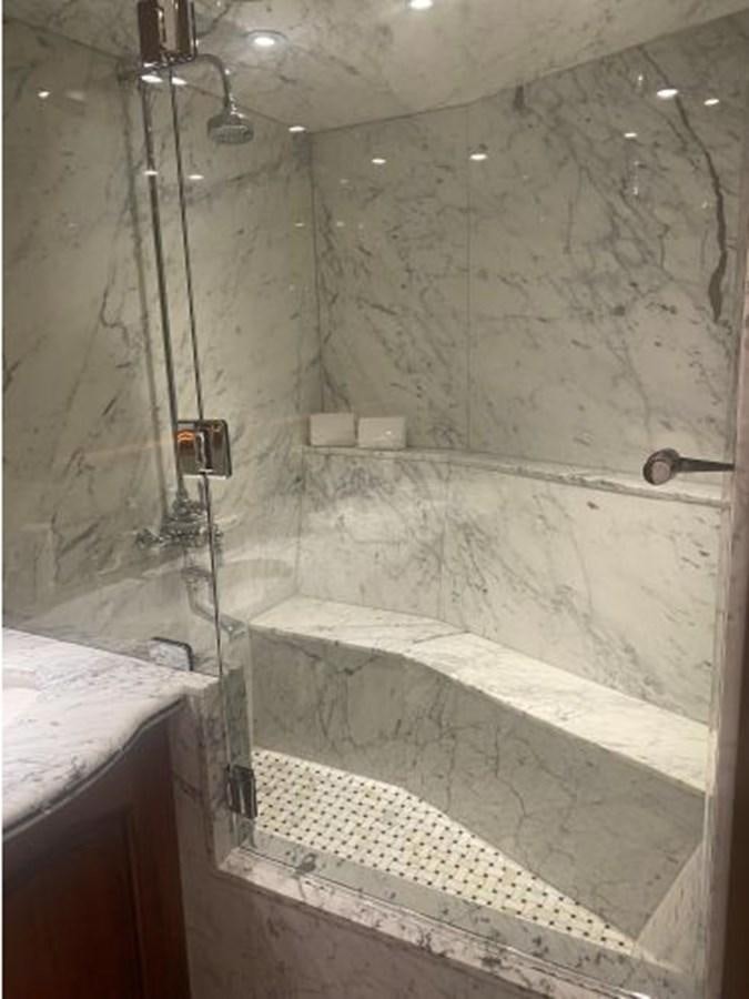 a bathroom with a shower aboard ALLSEAS 92 EXPEDITION Yacht for Sale