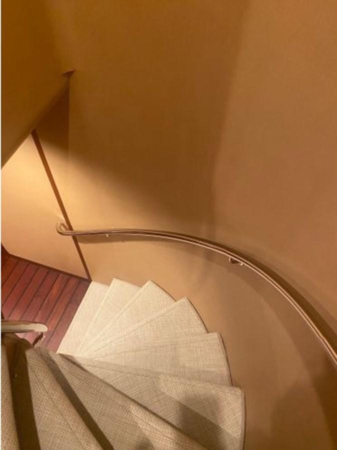 a white towel on a bed aboard ALLSEAS 92 EXPEDITION Yacht for Sale