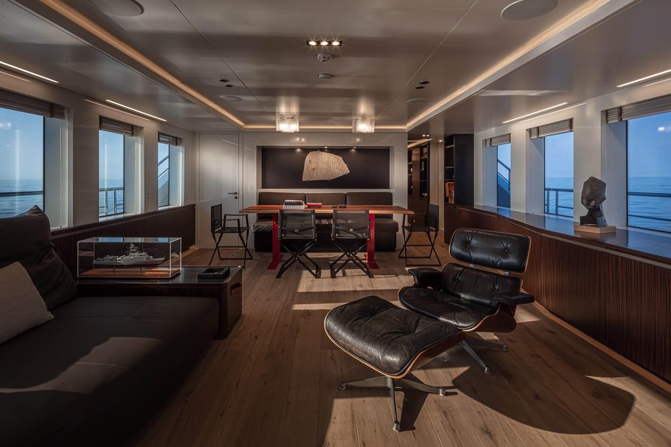a living room with a large screen aboard K584 HULL 2 Yacht for Sale