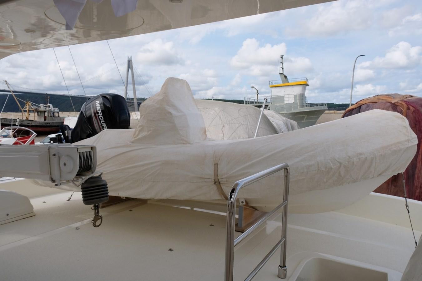 a white tent with a red tarp on it aboard WONDERLAND Yacht for Sale