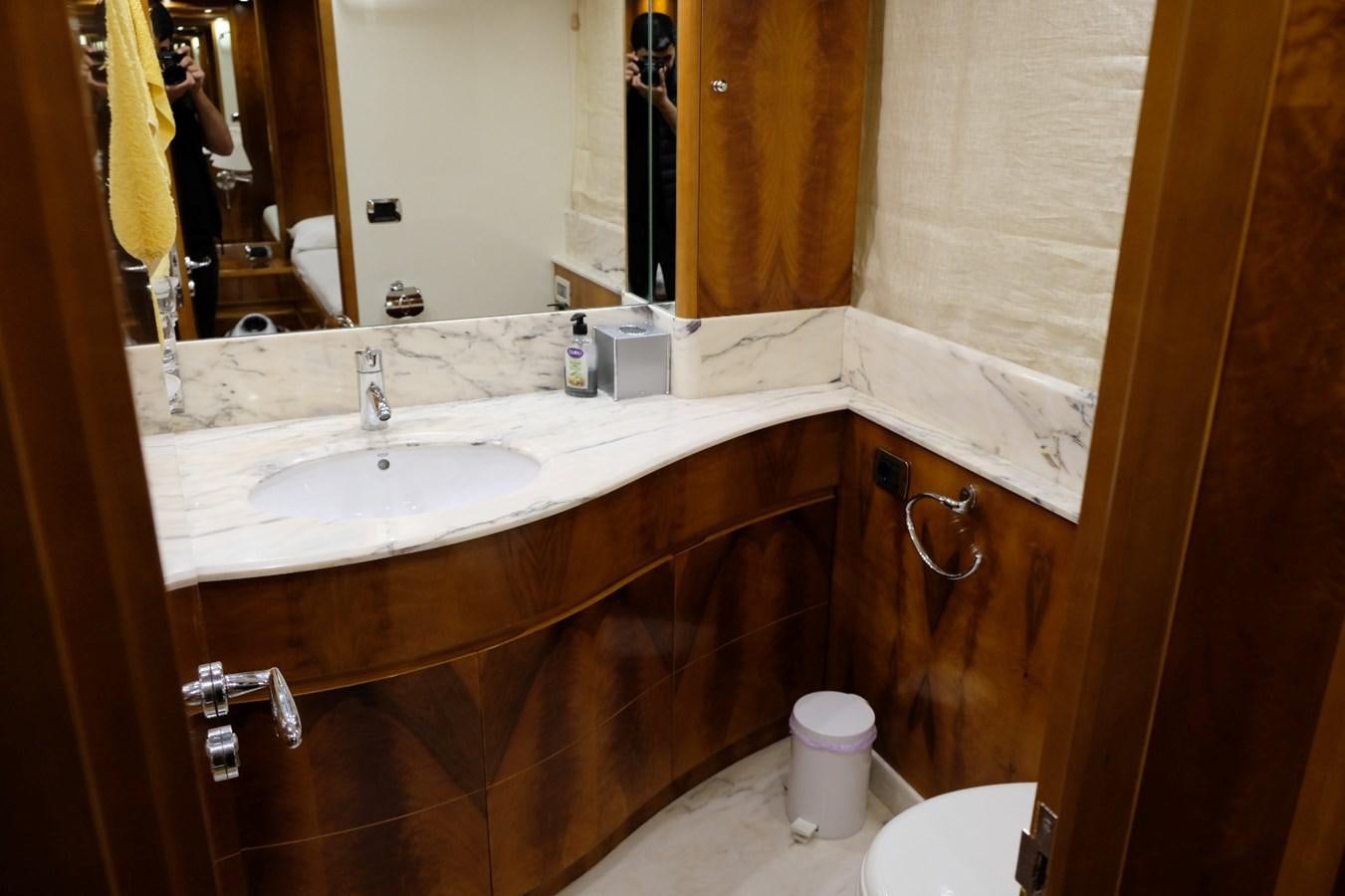 a bathroom with a sink and a mirror aboard WONDERLAND Yacht for Sale