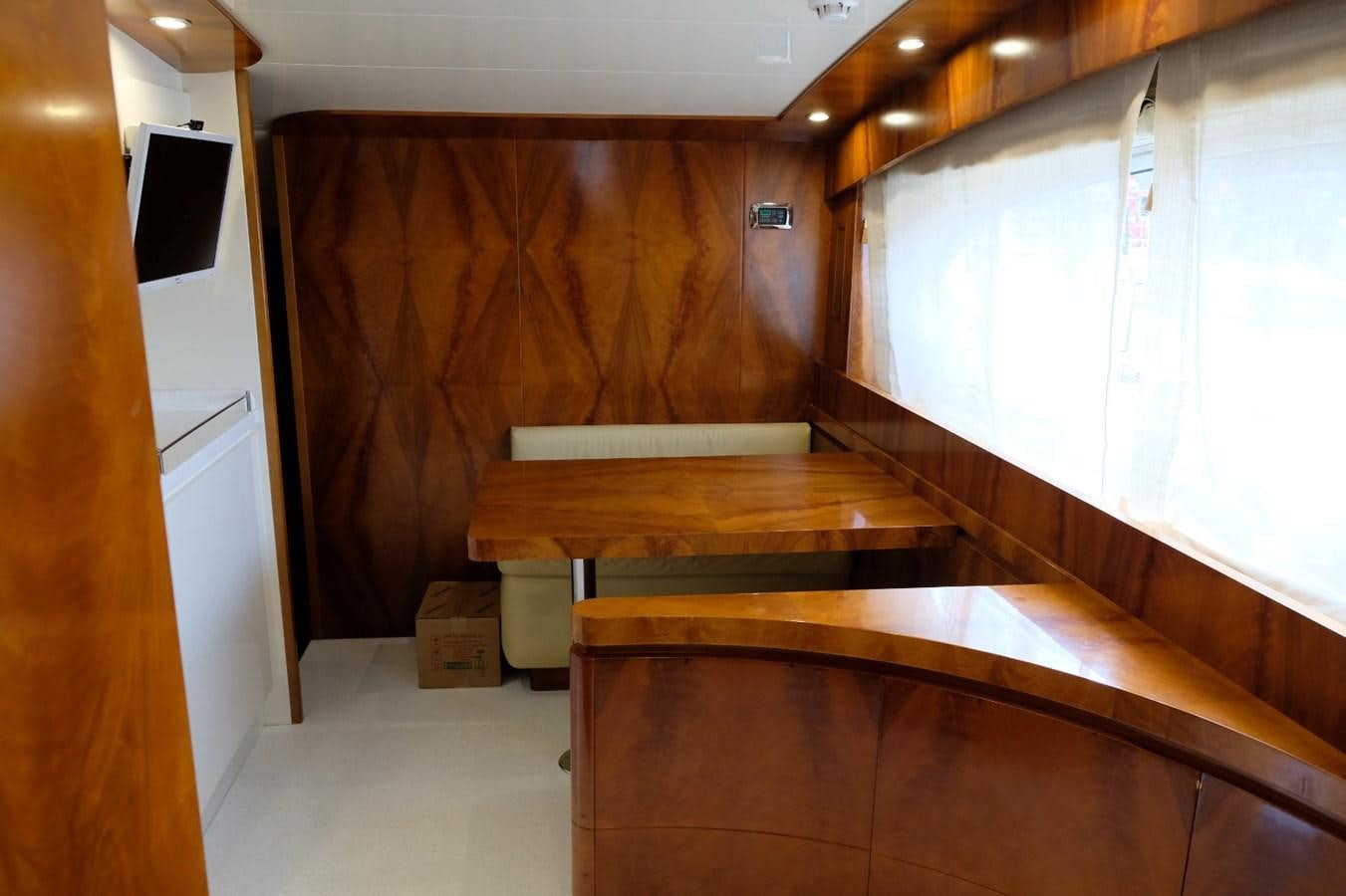 a room with wooden stairs aboard WONDERLAND Yacht for Sale