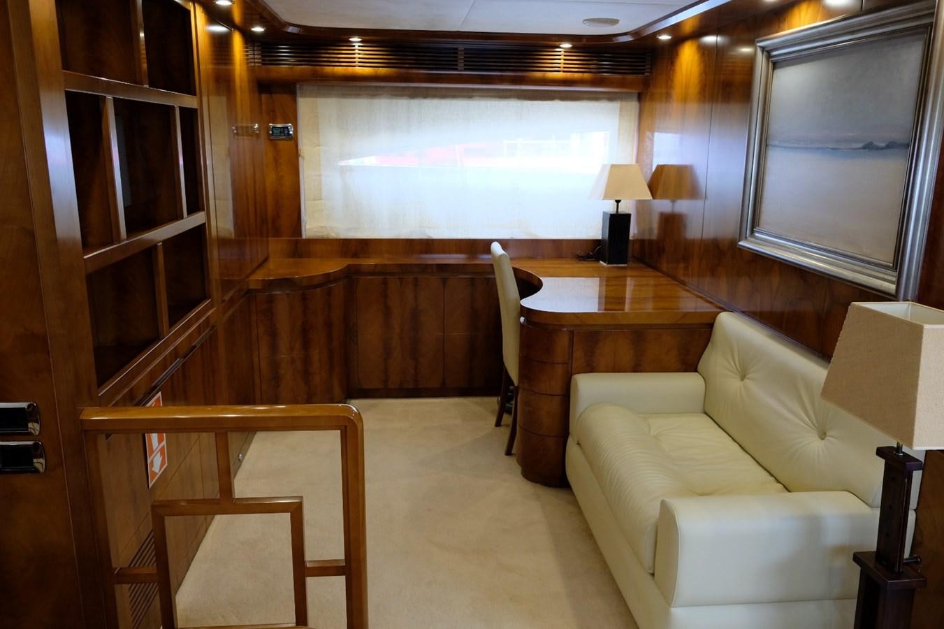 a room with a table and chairs aboard WONDERLAND Yacht for Sale