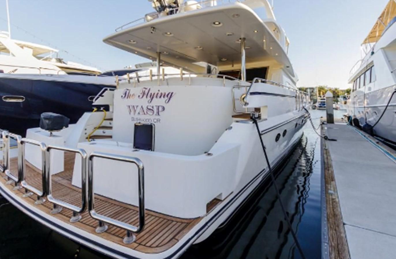 a boat docked at a pier aboard THE FLYING WASP Yacht for Sale