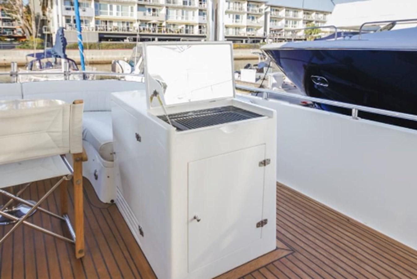 a laptop on a boat aboard THE FLYING WASP Yacht for Sale