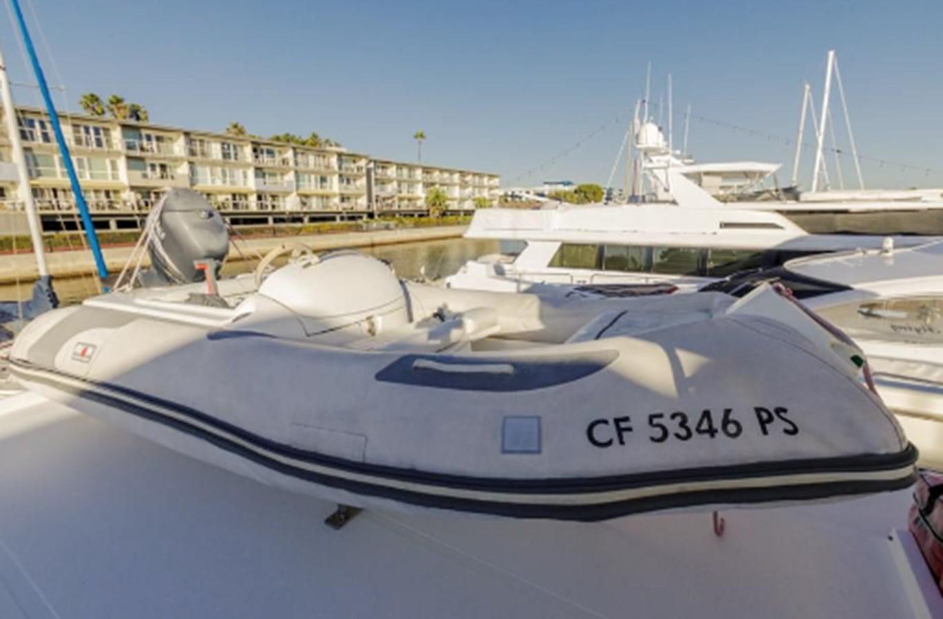 a boat parked in a harbor aboard THE FLYING WASP Yacht for Sale