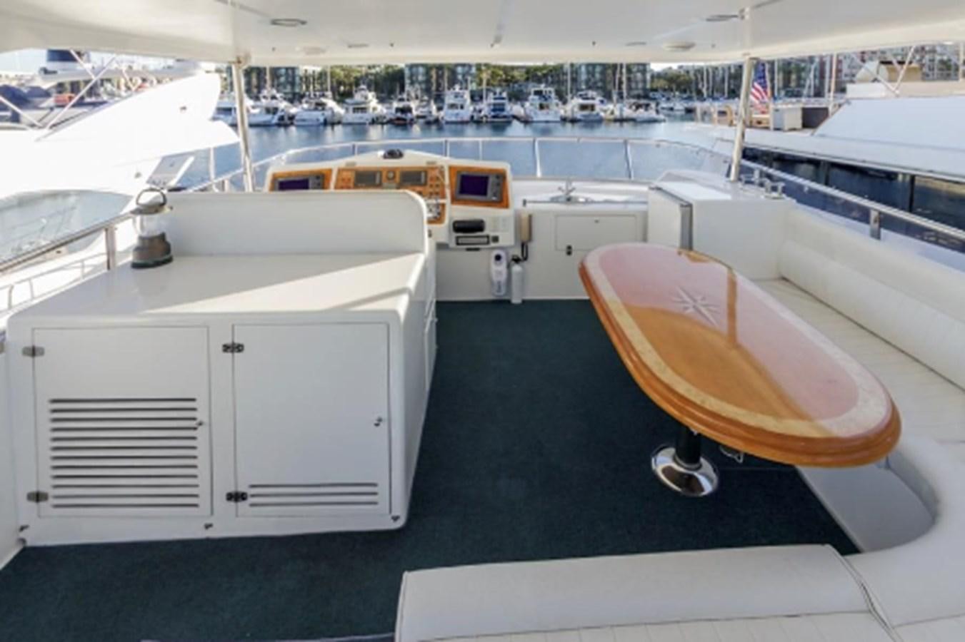 a room with a large white desk and a couple of white cabinets aboard THE FLYING WASP Yacht for Sale