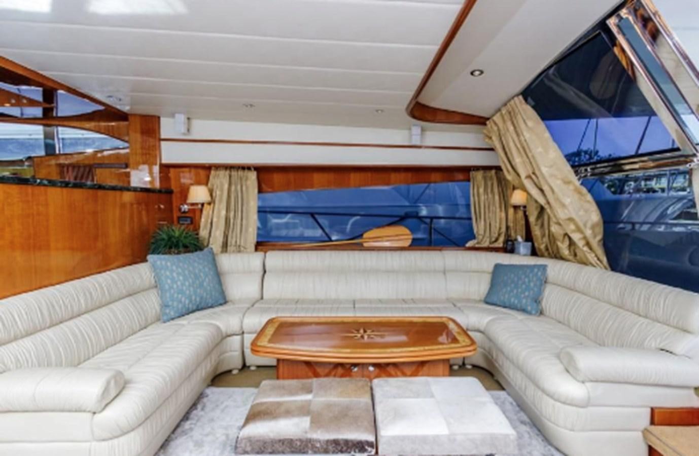 a living room with a large window aboard THE FLYING WASP Yacht for Sale