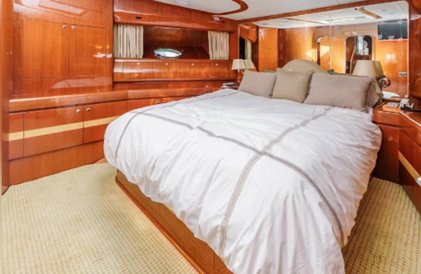 a bed in a room aboard THE FLYING WASP Yacht for Sale