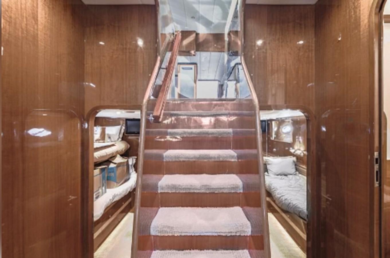 a set of stairs in a cabin aboard THE FLYING WASP Yacht for Sale
