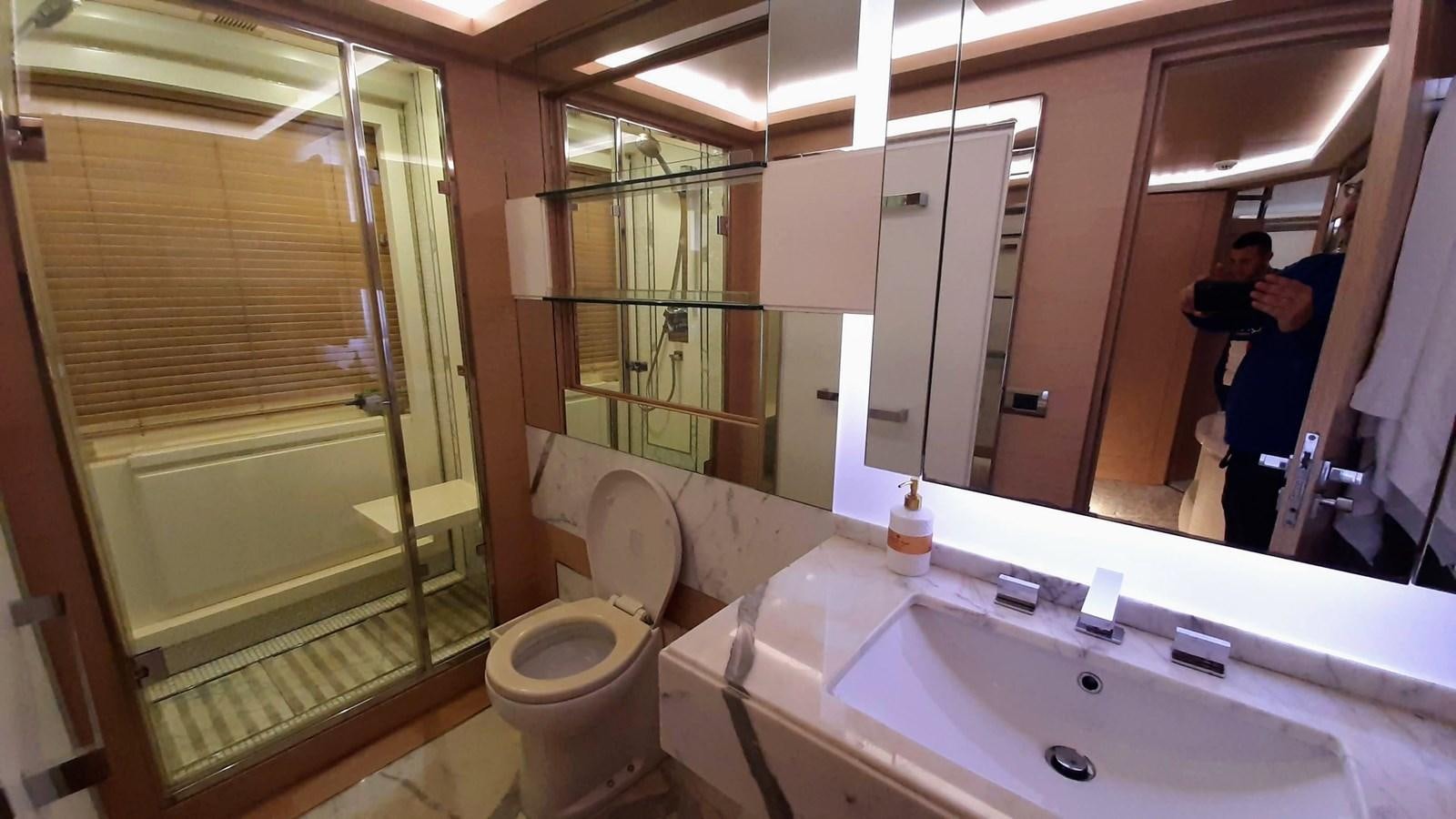 a bathroom with a sink and a toilet aboard BASMACI Yacht for Sale