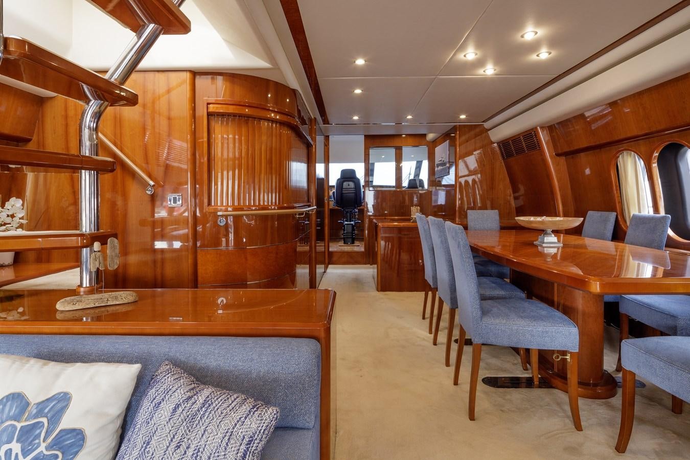 a room with a couch and a table and chairs aboard TAMARA S Yacht for Sale
