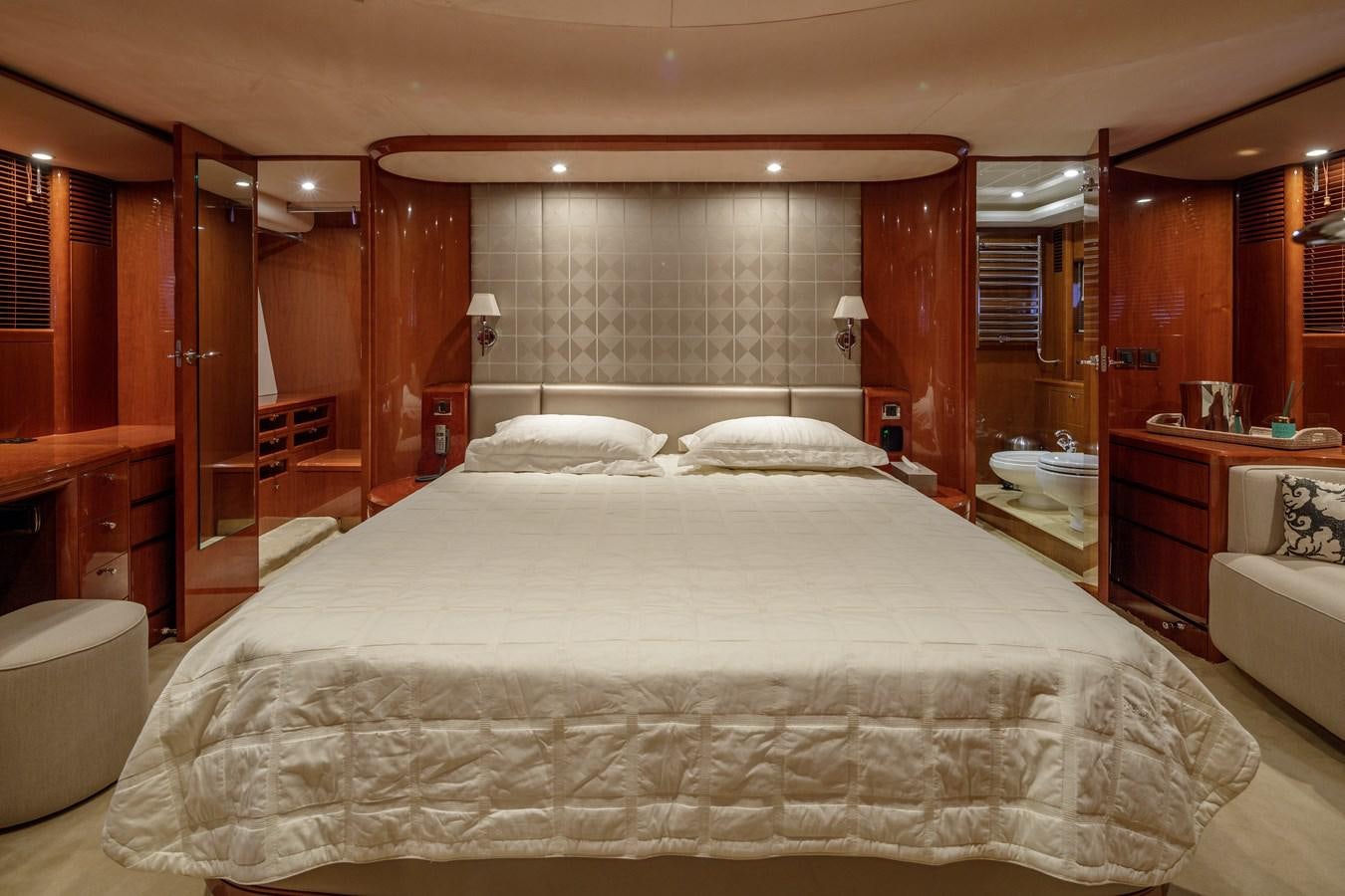 a large bed in a room aboard TAMARA S Yacht for Sale