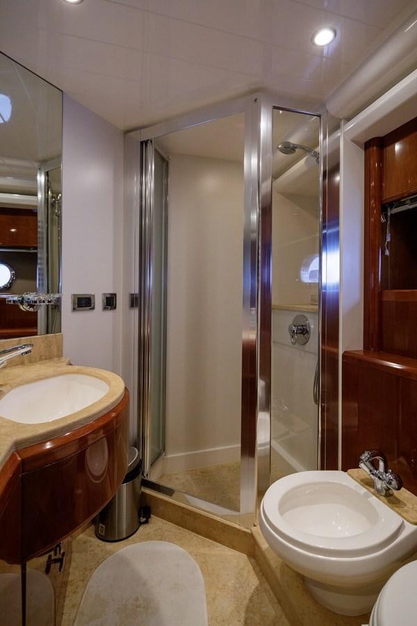 a bathroom with a shower and sink aboard TAMARA S Yacht for Sale