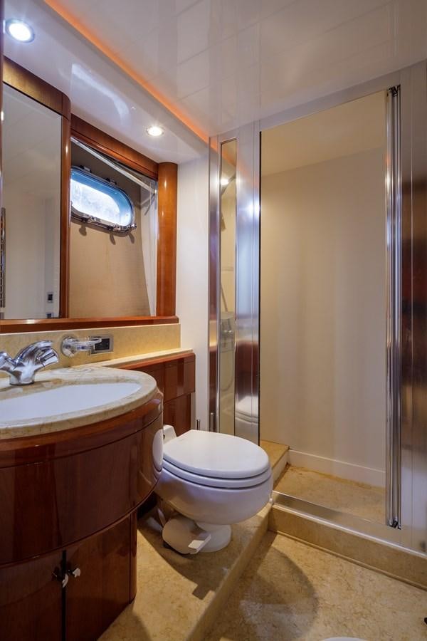 a bathroom with a glass shower aboard TAMARA S Yacht for Sale