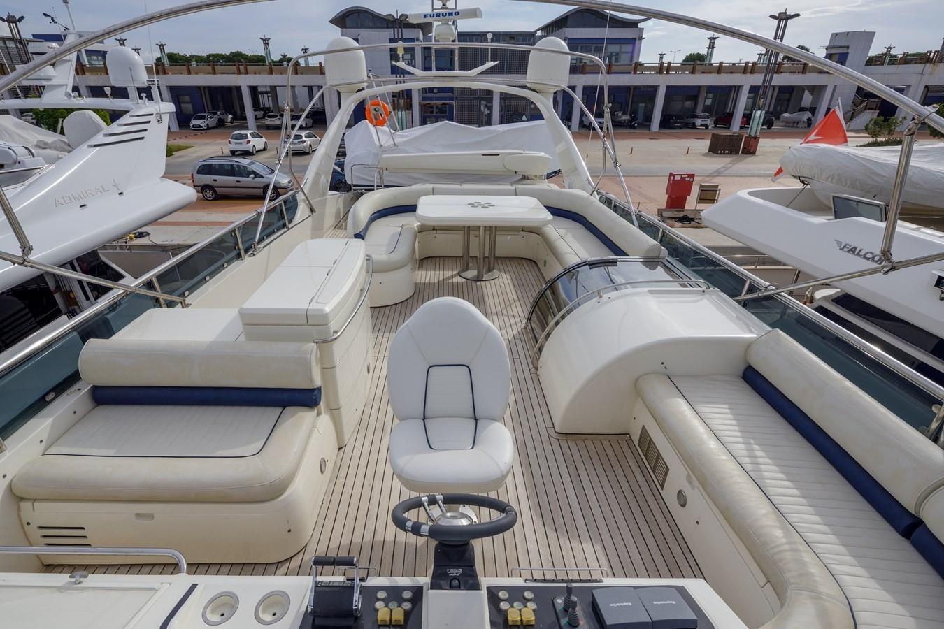 a boat dock with many boats aboard TAMARA S Yacht for Sale
