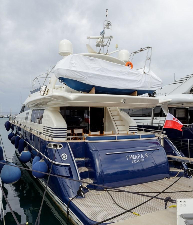 a boat docked at a pier aboard TAMARA S Yacht for Sale