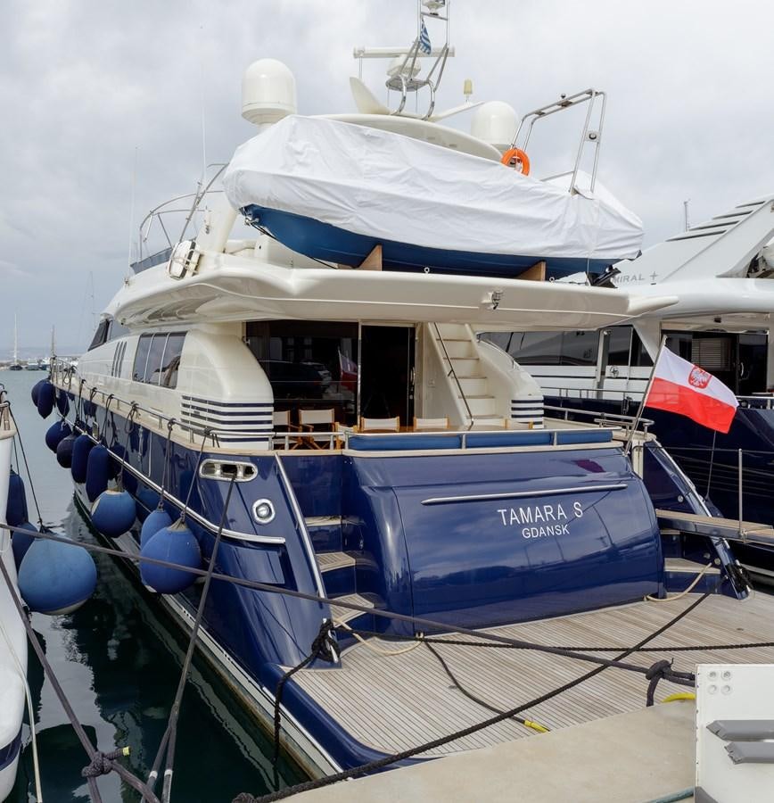 a boat docked at a pier aboard TAMARA S Yacht for Sale