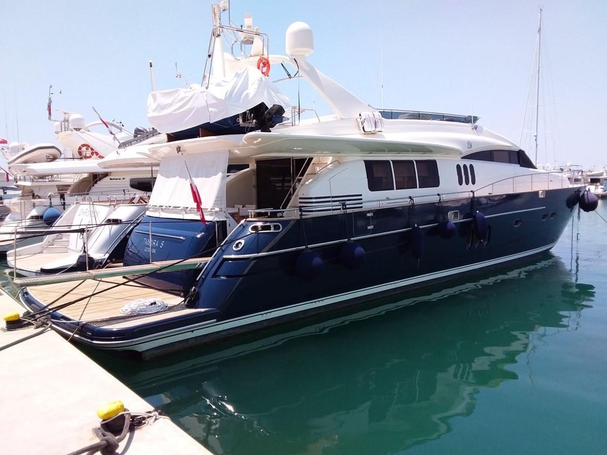 a boat docked at a pier aboard TAMARA S Yacht for Sale