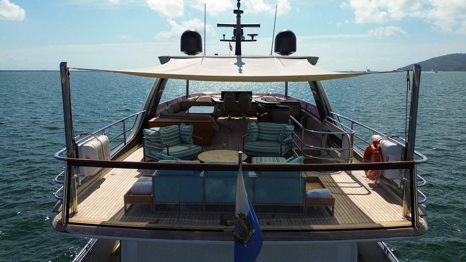 a boat with a group of chairs on it aboard AHAVA Yacht for Sale