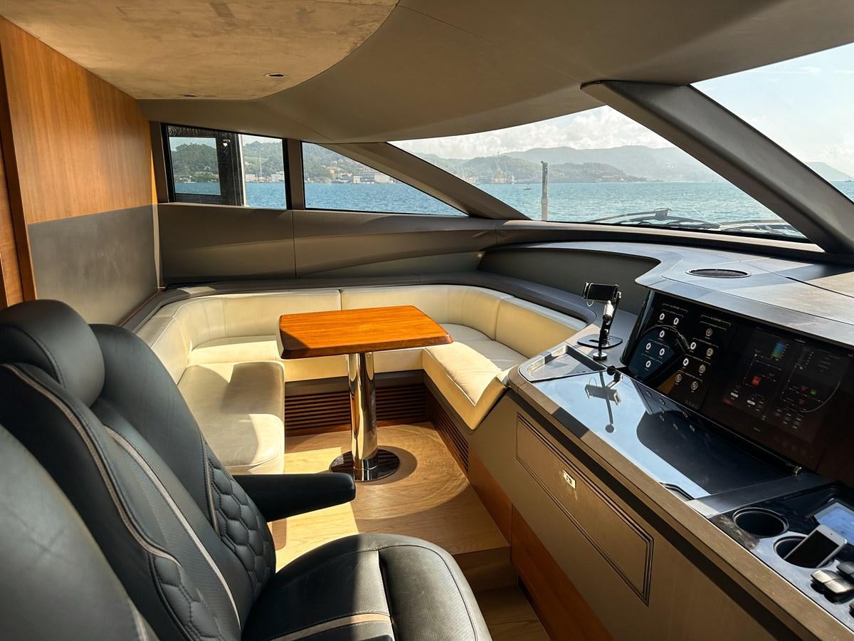 a car with a table and chairs aboard AHAVA Yacht for Sale