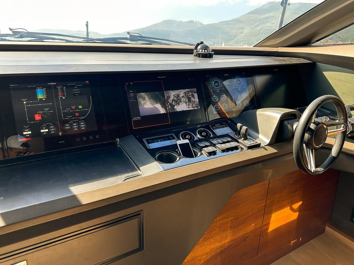 a coffee machine on a table aboard AHAVA Yacht for Sale