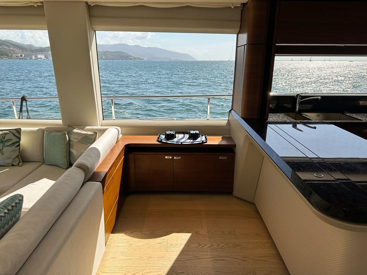 a room with a bed and a couch aboard AHAVA Yacht for Sale