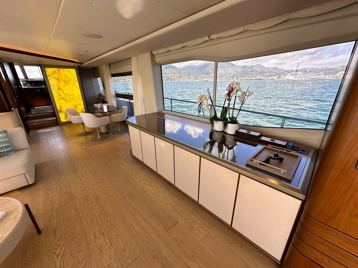 a kitchen with a large window aboard AHAVA Yacht for Sale