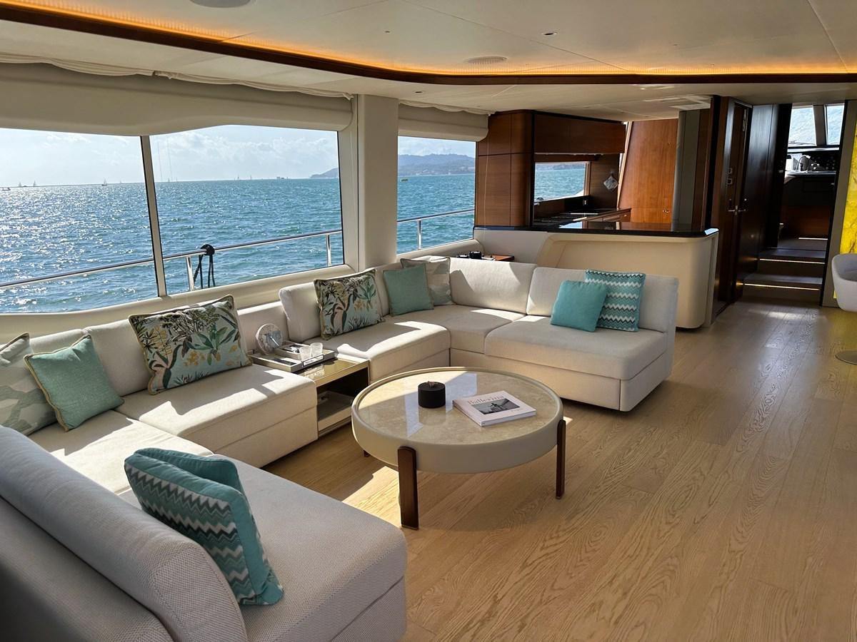 a living room with a large window aboard AHAVA Yacht for Sale