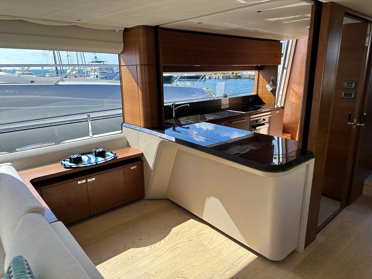 a room with a bed and a window aboard AHAVA Yacht for Sale