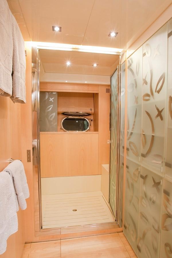 a kitchen with a microwave oven aboard COCA VI Yacht for Sale