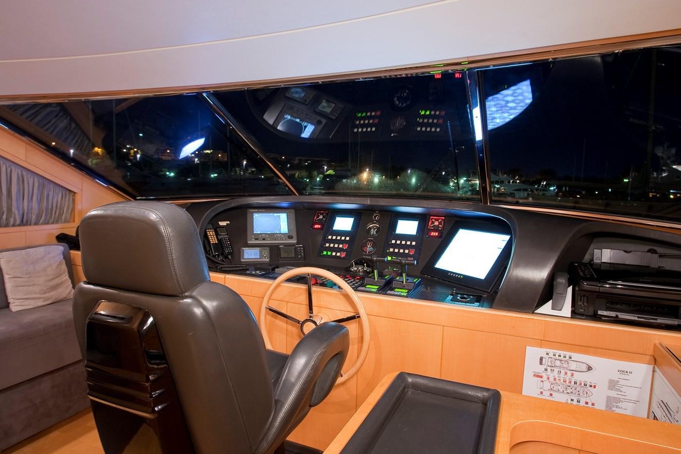 inside of a vehicle with many screens aboard COCA VI Yacht for Sale