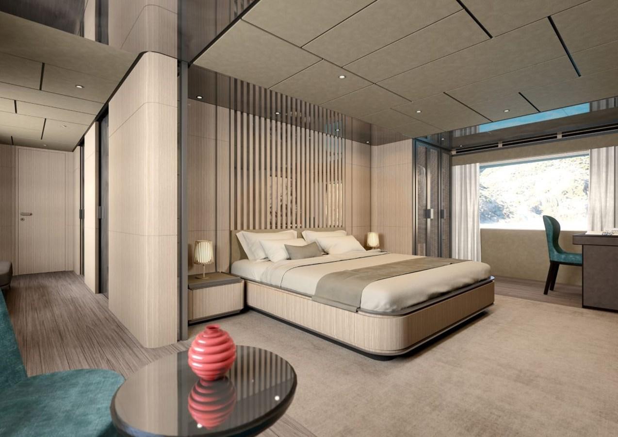 a bedroom with a bed and a chair aboard HORIZON Yacht for Sale