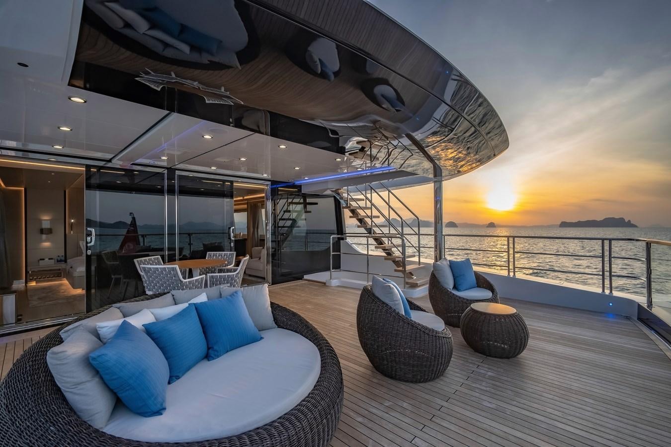 a large lounge area with a large deck and a large pool aboard SONG OF SONGS Yacht for Sale