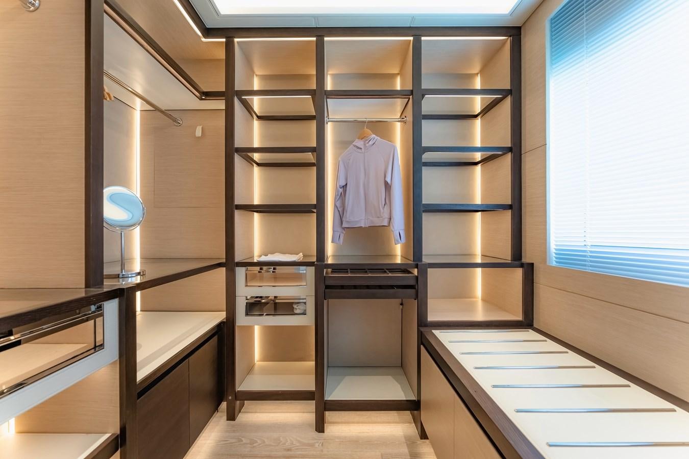 a room with a glass display case aboard SONG OF SONGS Yacht for Sale