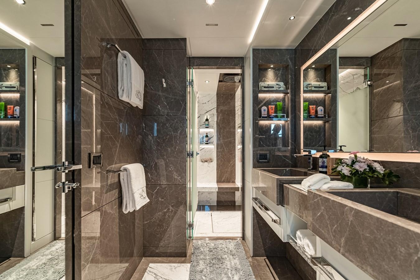 a bathroom with a large bathtub aboard SONG OF SONGS Yacht for Sale