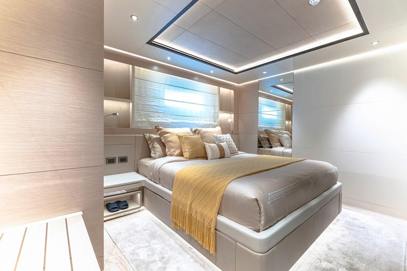 a bed in a room aboard SONG OF SONGS Yacht for Sale