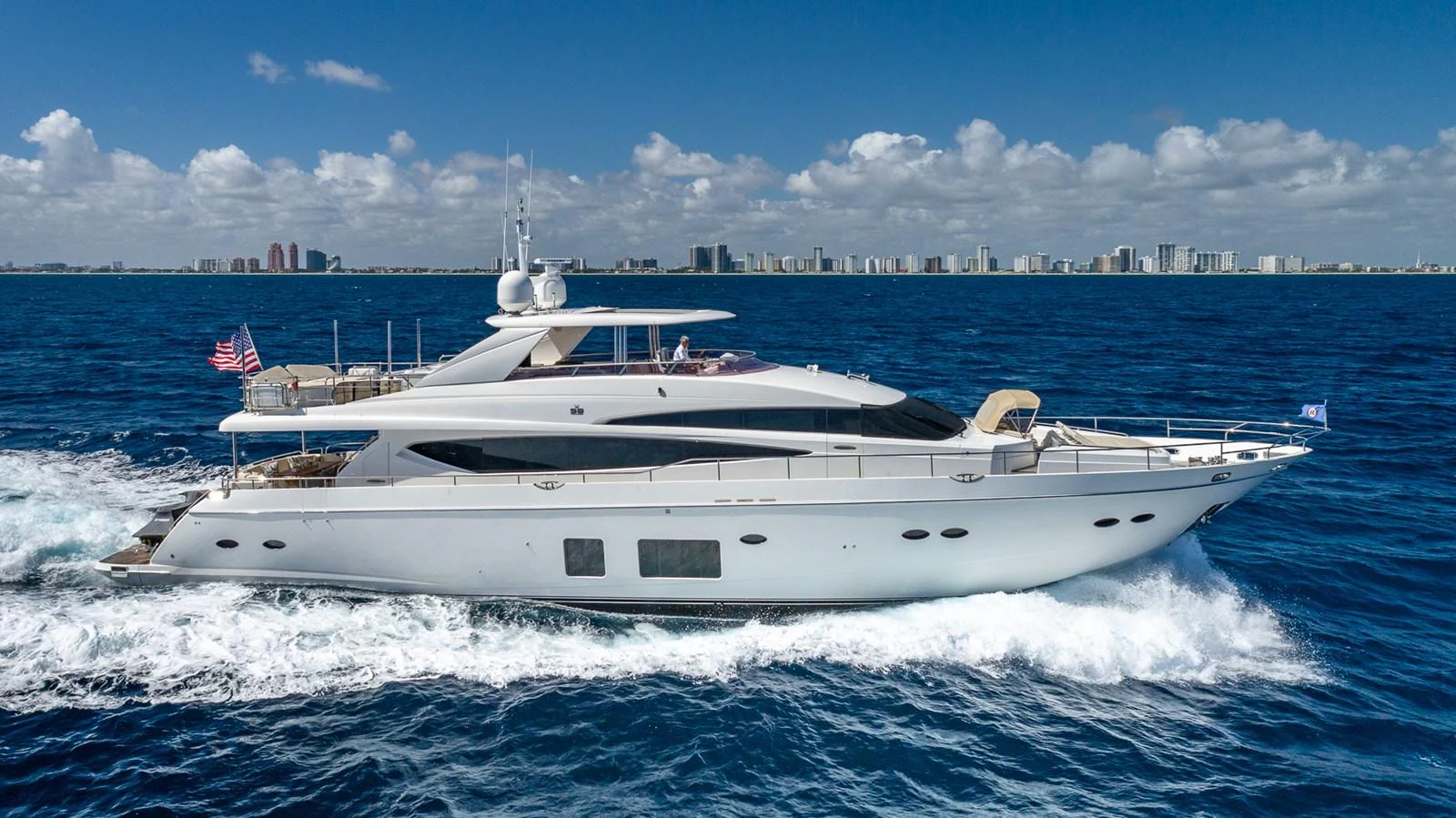 a white yacht on the water aboard LADY COPE Yacht for Sale