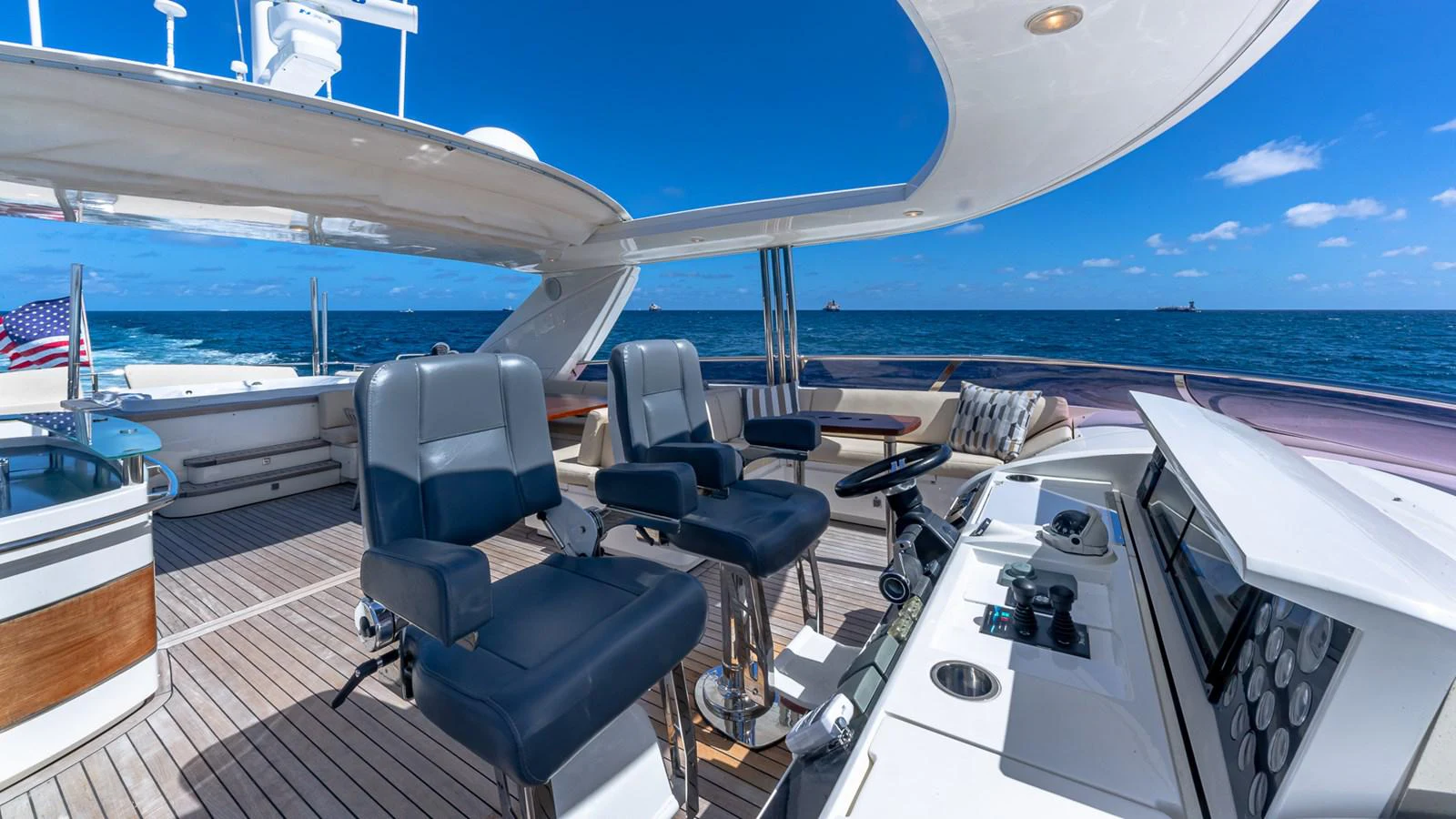 a deck with a view of the ocean and the deck aboard LADY COPE Yacht for Sale