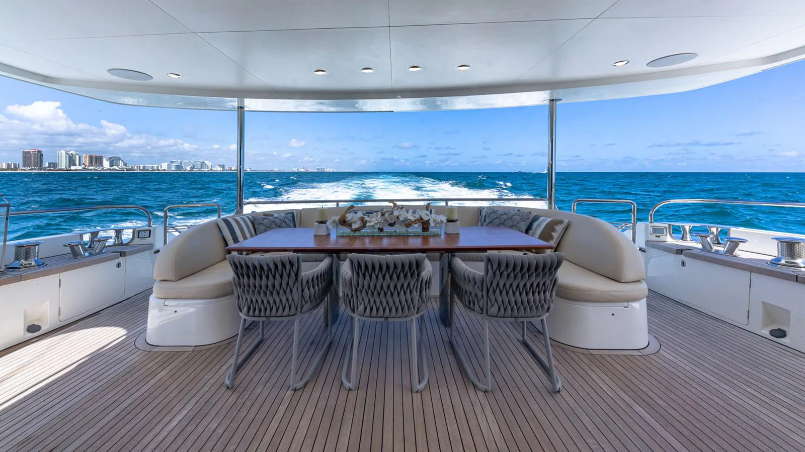 a table and chairs on a boat aboard LADY COPE Yacht for Sale