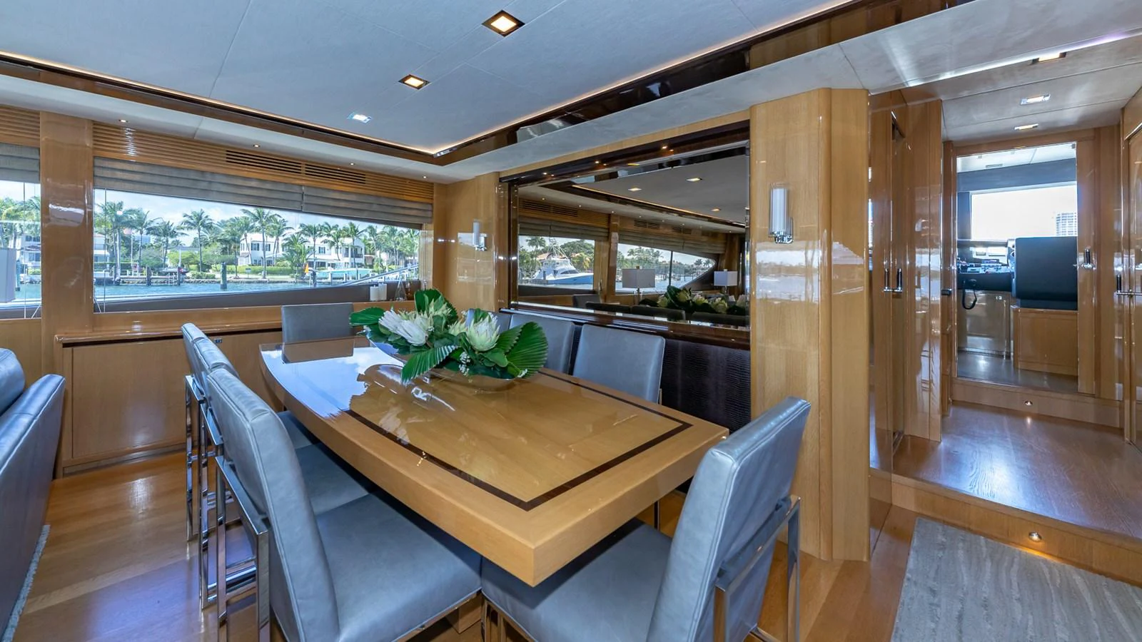 a dining table in a room aboard LADY COPE Yacht for Sale