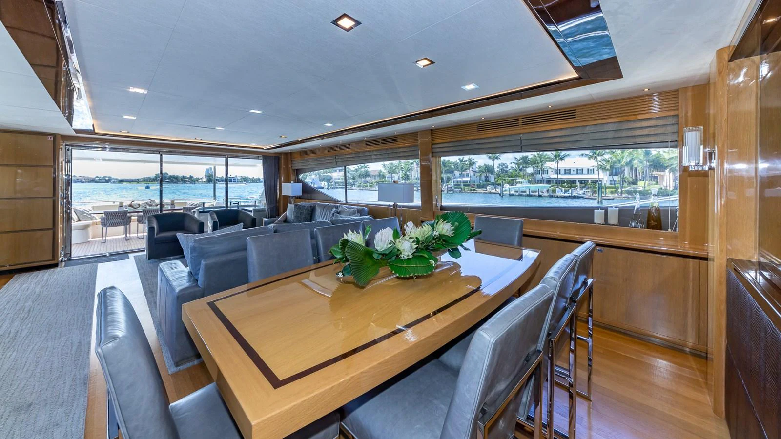 a room with a table and chairs aboard LADY COPE Yacht for Sale