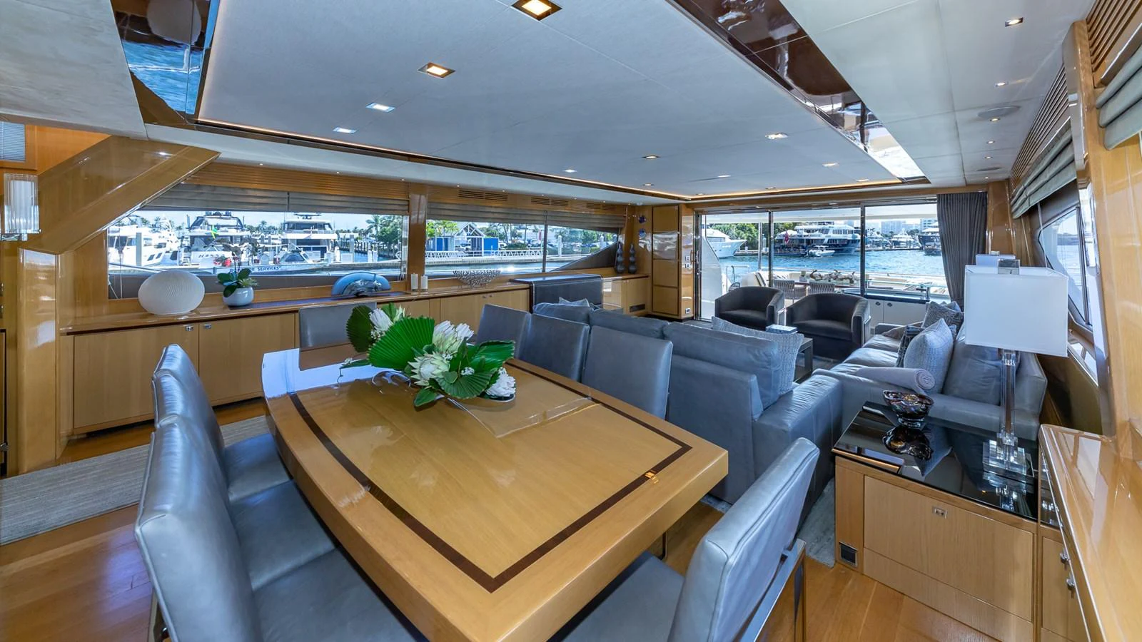 a room with a table and chairs aboard LADY COPE Yacht for Sale